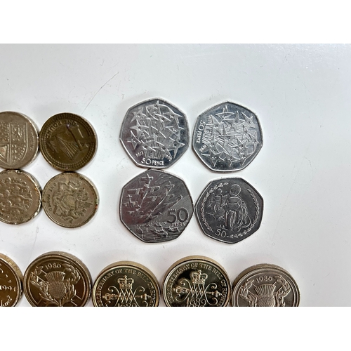 53 - A collectable lot of of vintage one pound (Â£1) and fifty pence (50p) pieces, including highly sough... 