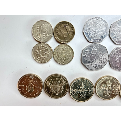 53 - A collectable lot of of vintage one pound (Â£1) and fifty pence (50p) pieces, including highly sough... 