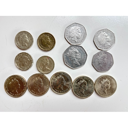 53 - A collectable lot of of vintage one pound (Â£1) and fifty pence (50p) pieces, including highly sough... 