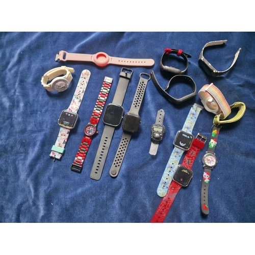 59 - Job lot of smart and analogue watches, Star Wars, Ice Watch, Hello Kitty Etc