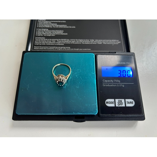 8 - Hallmarked gemstone set ring set in 9ct Gold with a gross weight of 3g