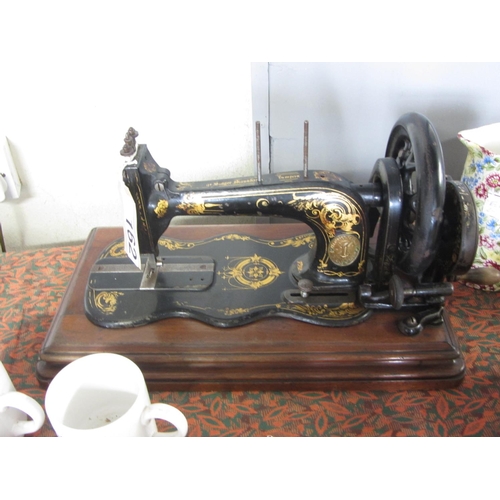 162 - Antique sewing machine.