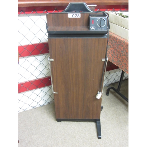 28 - Electric trouser press.