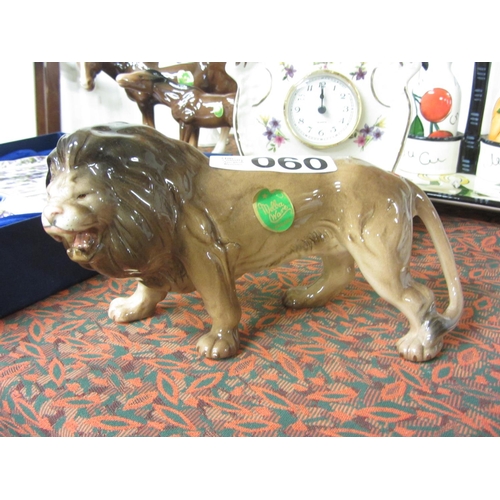 60 - Melba ware lion.