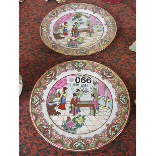 66 - Pair of hand painted Chinese wall plaques.