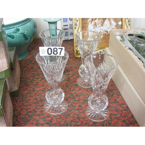 87 - Set of 4 cut glass vases.