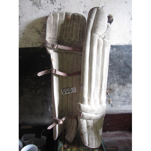 55 - Pair of antique cricket pads.