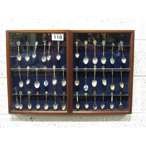 118 - Cased set of spoons of the world.