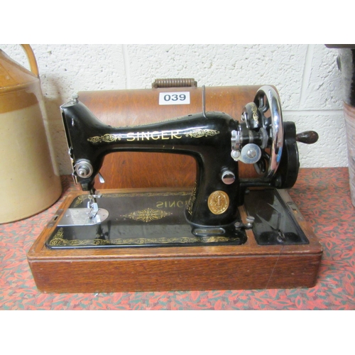 39 - Good Antique Singer sewing machine in case.