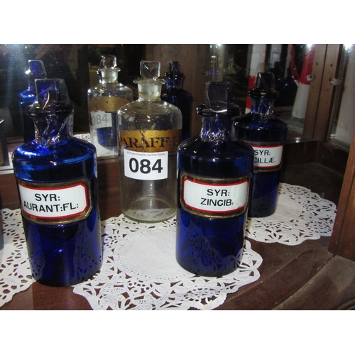 84 - 4 Antique Chemist Bottles.