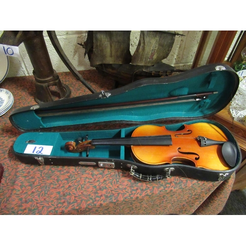 12 - Violin in case with bow.