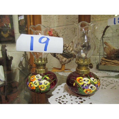 19 - Miniature hand painted oil lamps. H:15cm.