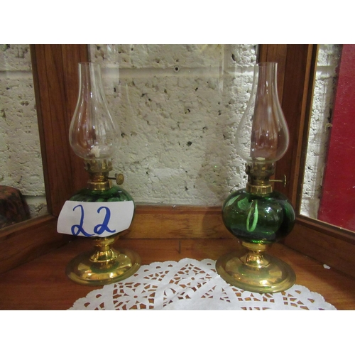 22 - Pair of brass stem colored bowl oil lamps.  H:29cm