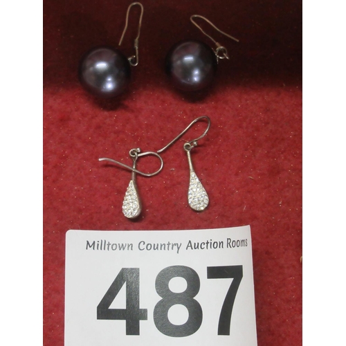 487 - Pair of Black pearl on silver earrings plus pair of dress earrings.