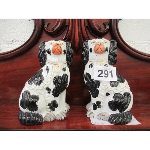 291 - Pair of Staffordshire dogs.