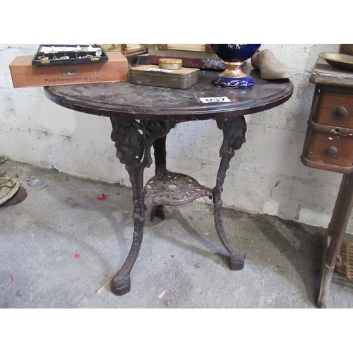 37 - Victorian occasional round table on carved cast iron pod.