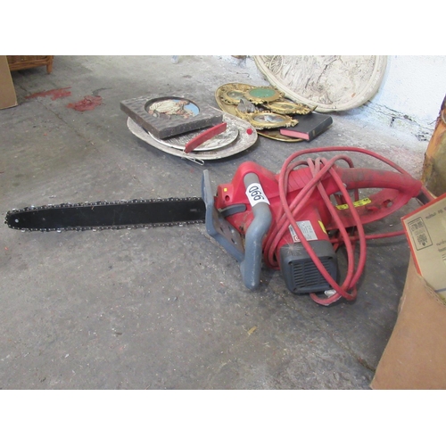 66 - Electric chain saw in working order.