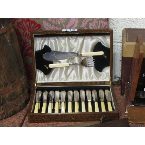 116 - Case set of Sheffield plated fish knives and folks including serving set.