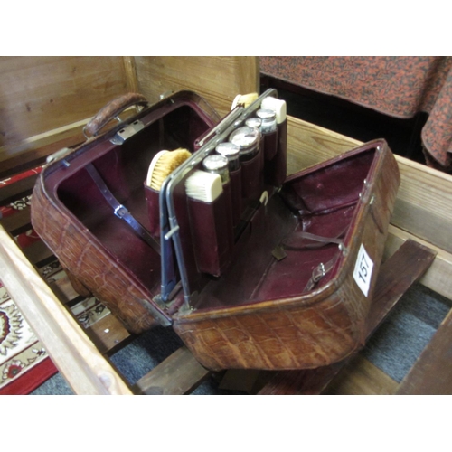 157 - Vintage Gents travelling leather vanity case with silver top bottles.