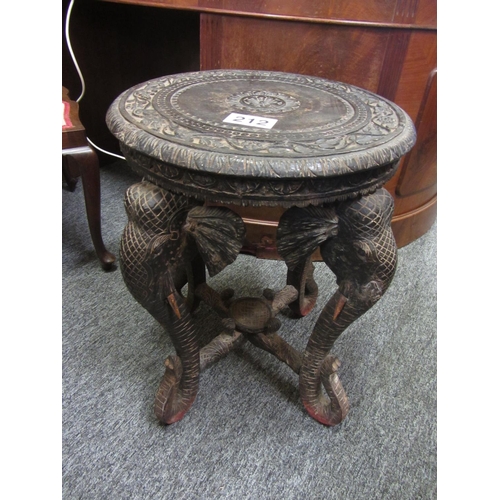 212 - Good 18th century carved oak occasional table on Elephant tusk supports.  H:56cm, Diameter:46cm.