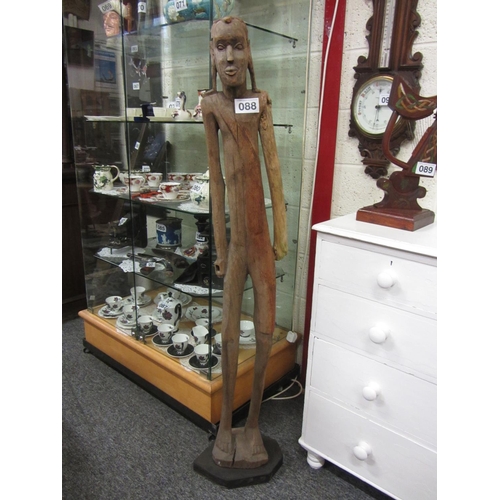 88 - Large carved wooden African figure.  H:150cm.