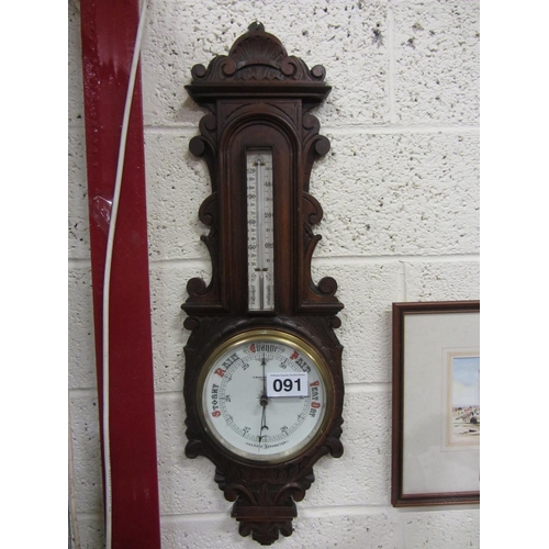 91 - Good victorian carved oak Aneroid Barometer.  H:85cm.