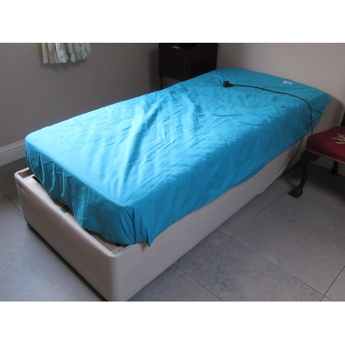 Single electric bed.