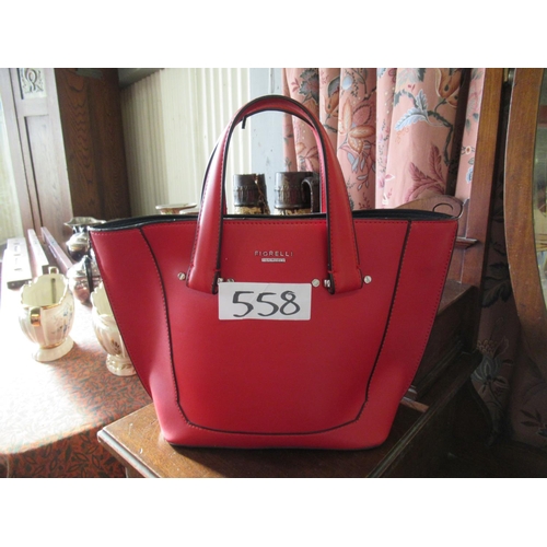 558 - Fiorelli designer hand bag.