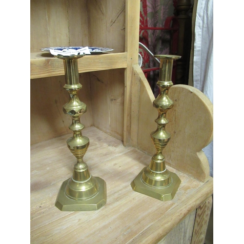 60 - Good pair of victorian brass candle holders.