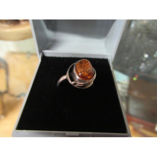 225 - Amber sterling silver ring.