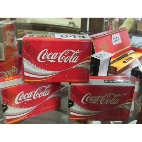 44 - 3 Coca Cola Limited edition cameras.