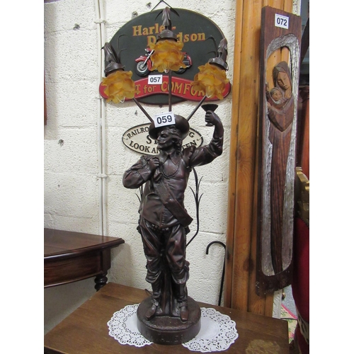 59 - Large Cavalier lamp with amber shade.   H:105cm.