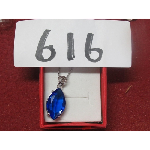 616 - Large Blue stone silver pendent on silver chain.