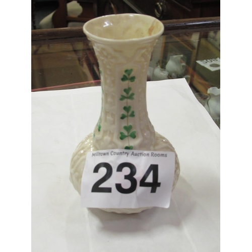 234 - Belleek black stamp vase - some damage.