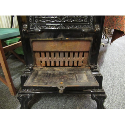 383 - Good French cast iron stove with cooking facilities.  H:90cm, W:52cm, D:38cm.