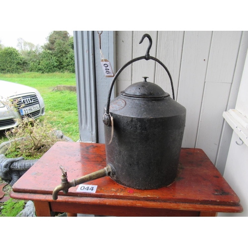 45 - Antique Road side pot with brass tap.