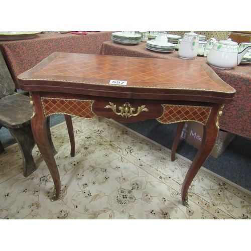 557 - French mahogany brass mounted fold over card table.  Top: 85cm x 45cm. When opened: 87cm x 85cm.