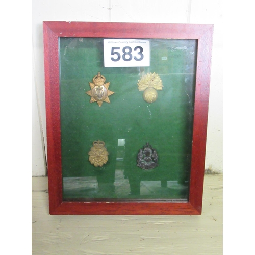 583 - 4 Framed Hat Badges.