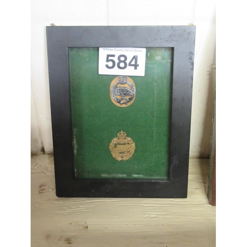 584 - 2 framed Tank Badges.