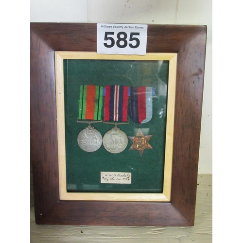 585 - 3 framed 2nd World War Medals.