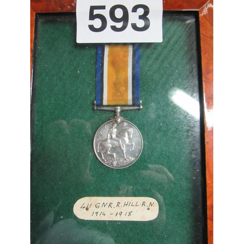 593 - Framed 1st World War Badge.