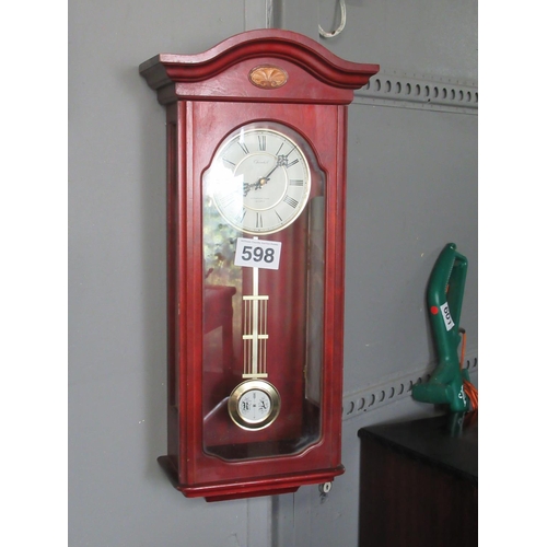 598 - Mahogany inlaid Quartz wall clock.  H:65cm.