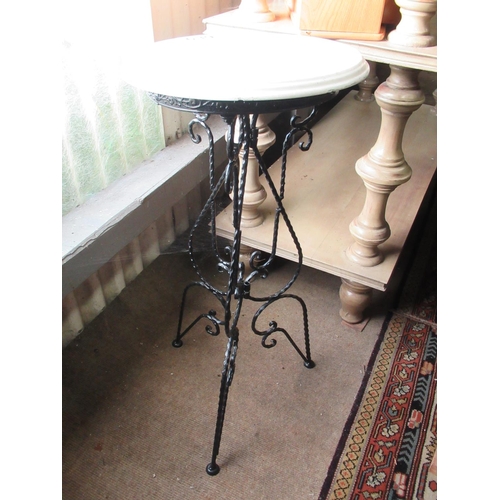 639 - Pair of marble top plant stands.  H:70cm, diameter top:35cm.