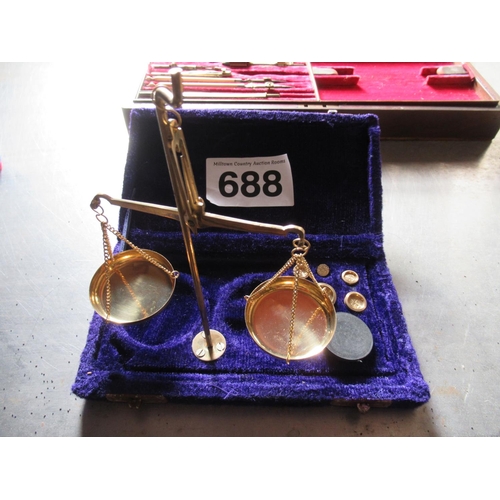 688 - Brass scales in case.