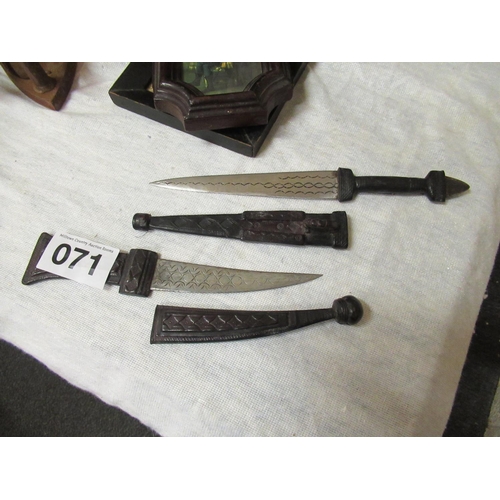 71 - 2 Antique daggers with scabbards.