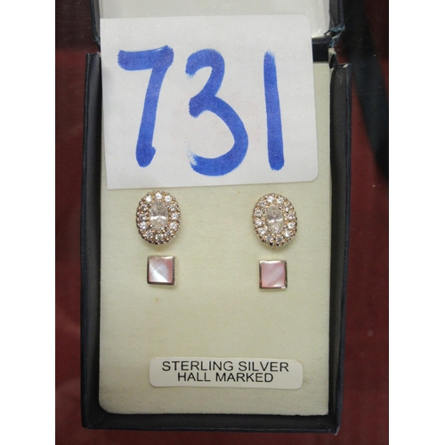 731 - Ladies silver earrings.