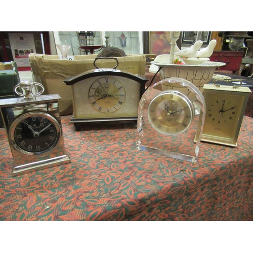 99 - 4 assorted Mantle clocks.