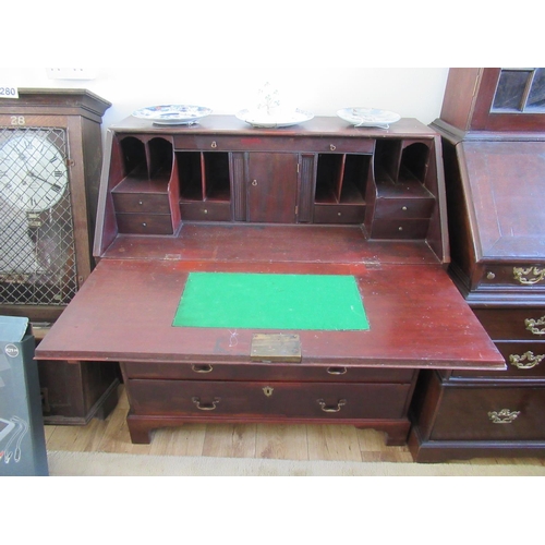 240 - Georgian Mahogany Writing Bureau with fitted interior. Graduated drawers on bracket feet.