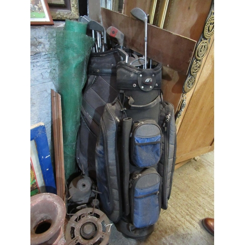 73 - 2 Golf Bags & Clubs.  Approx 15