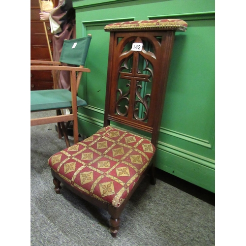 142 - Victorian mahogany carved back prayer chair.  H:92cm.